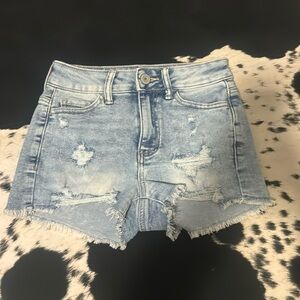 Women’s size 0/24 high rise distressed SO jean shorts